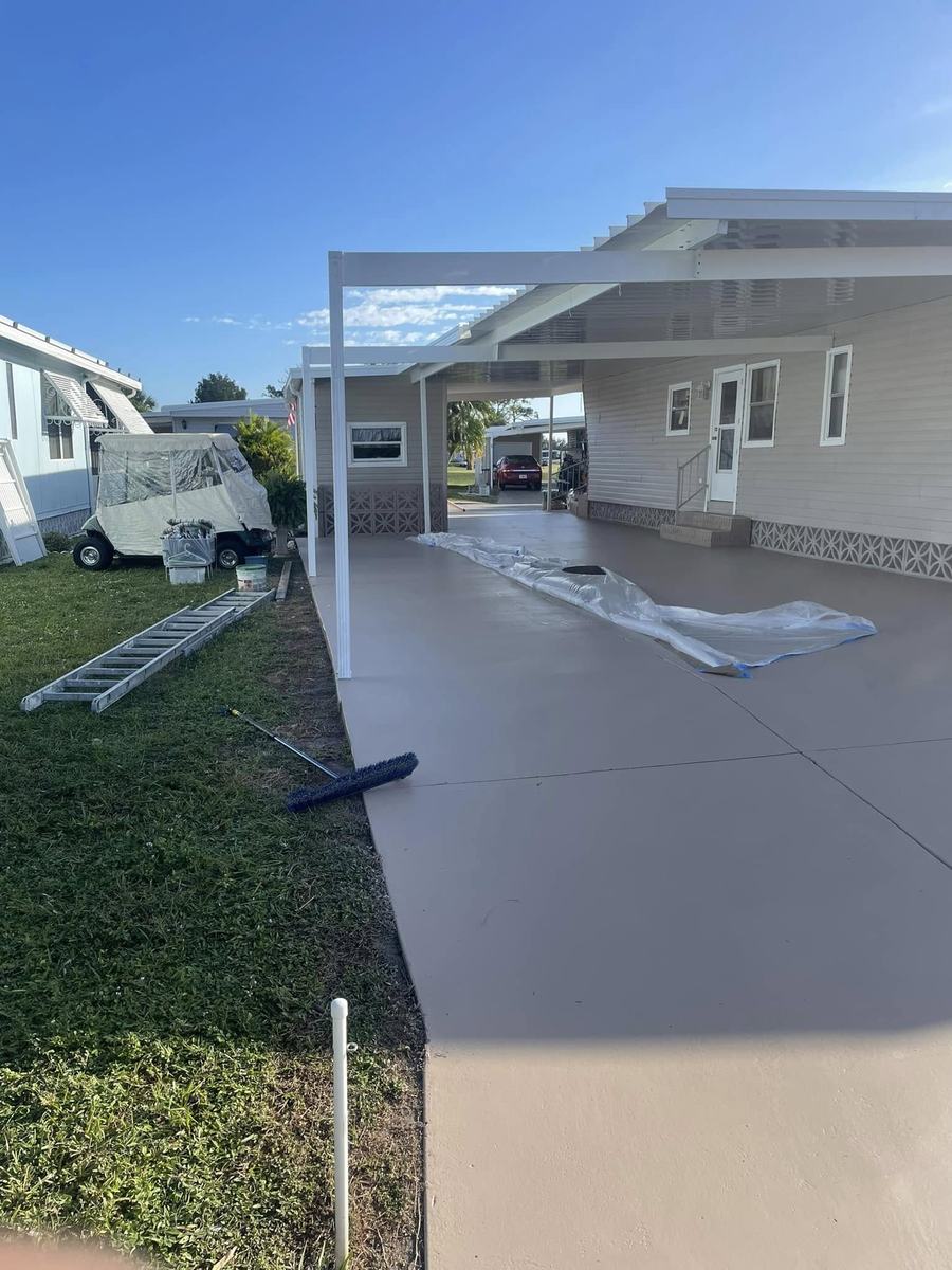 Exterior project 3, after &mdash; carport slab freshly coated