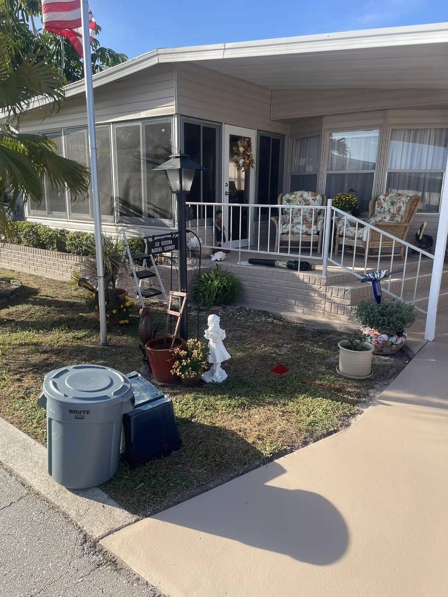 Exterior project 3, after &mdash; front porch with repainted skirting