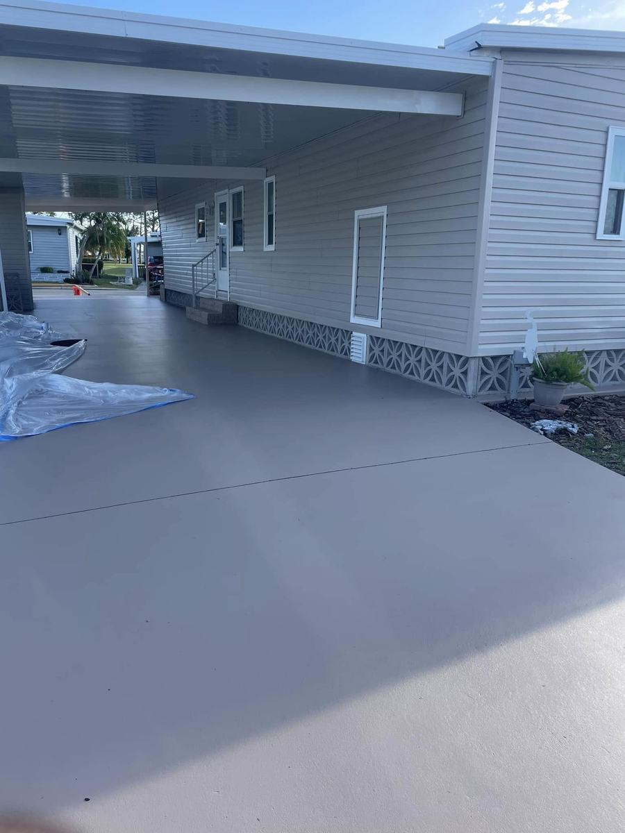 Exterior project 3, after &mdash; freshly coated drive along the house