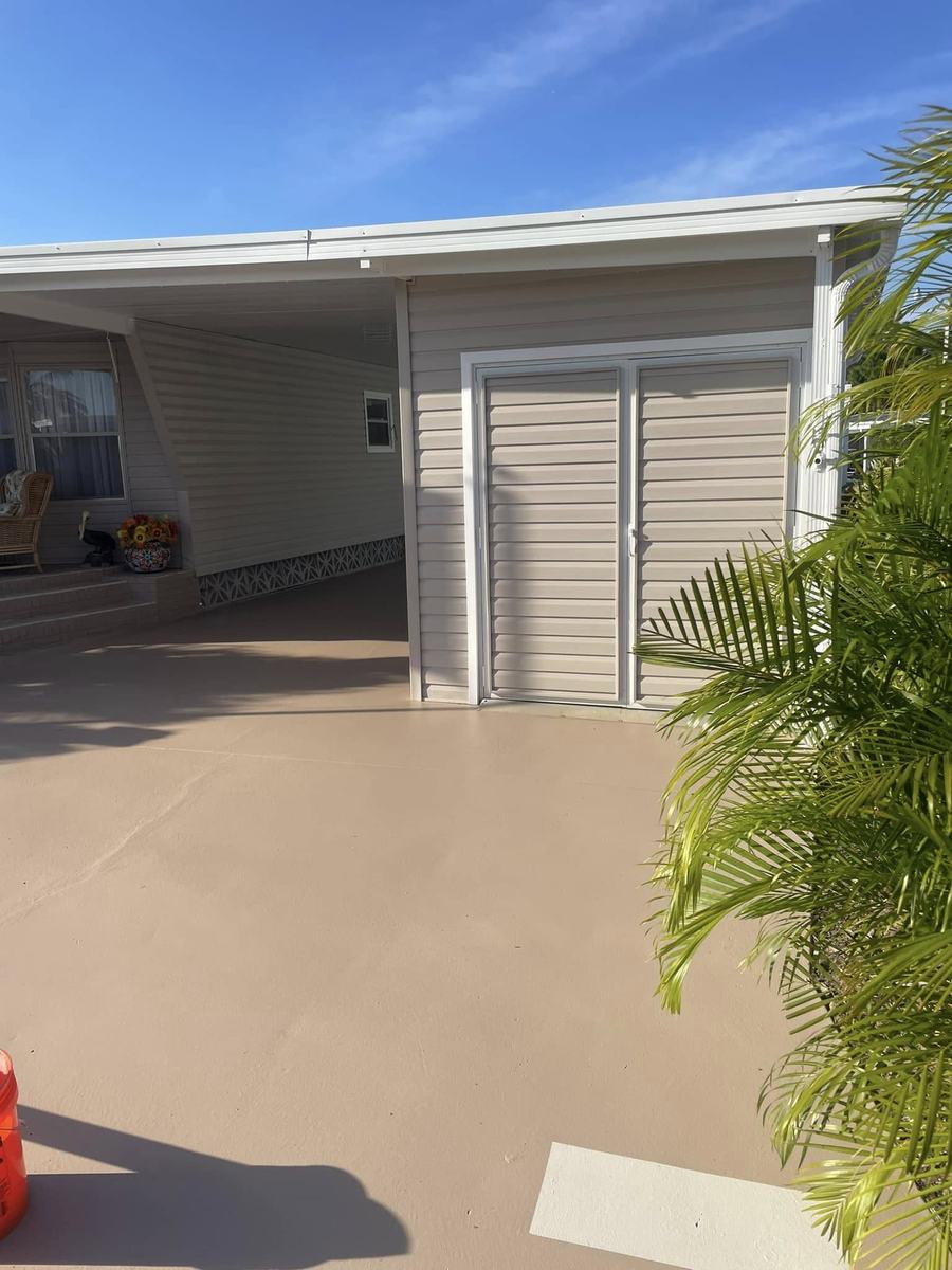 Exterior project 3, after &mdash; carport slab in the new finish