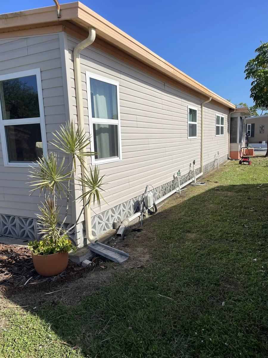 Exterior project 3, before &mdash; side wall and windows